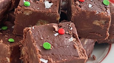 plate of Mamie's million dollar fudge with flakes salt and red and green sprinkles