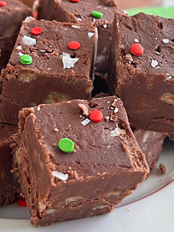 plate of Mamie's million dollar fudge with flakes salt and red and green sprinkles