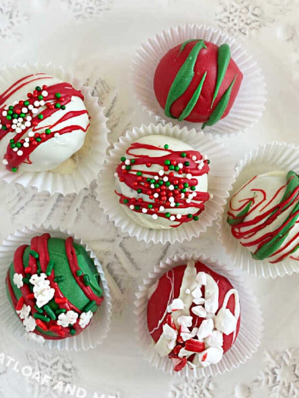 Christmas oreo cake balls on a white platter