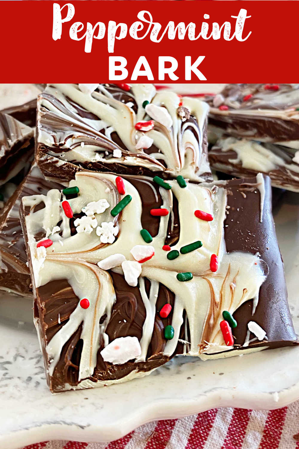 This Easy Peppermint Bark recipe made with white chocolate, semisweet chocolate and crushed peppermint candies is a festive holiday treat! Homemade peppermint bark makes a delicious Christmas gift for everyone on your list! via @meamel