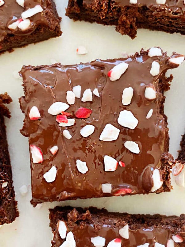 peppermint brownies with chocolate frosting and crushed candy canes