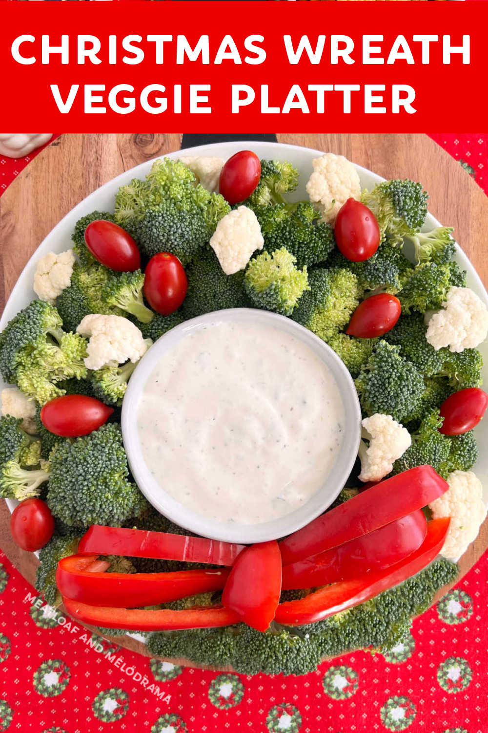 This Christmas Wreath Vegetable Platter is an easy appetizer made with broccoli and other raw vegetables in the shape of a holiday wreath. Your guests will love this festive veggie tray! via @meamel