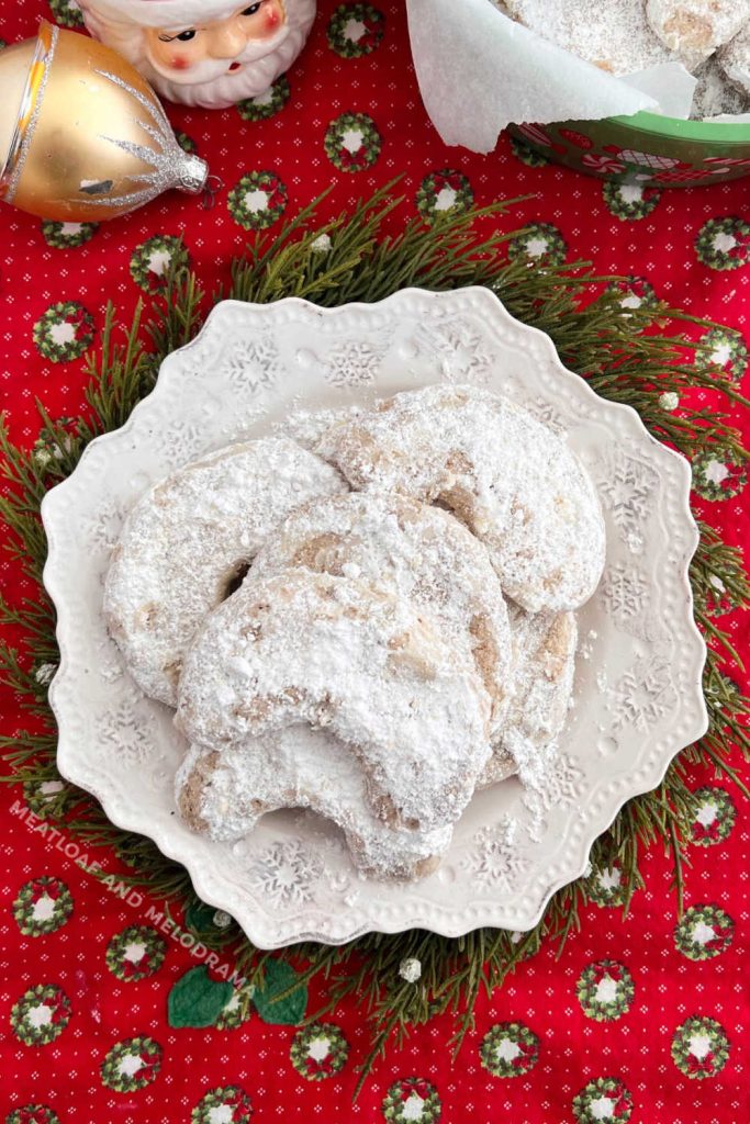 Christmas crescents with powdered sugar on table