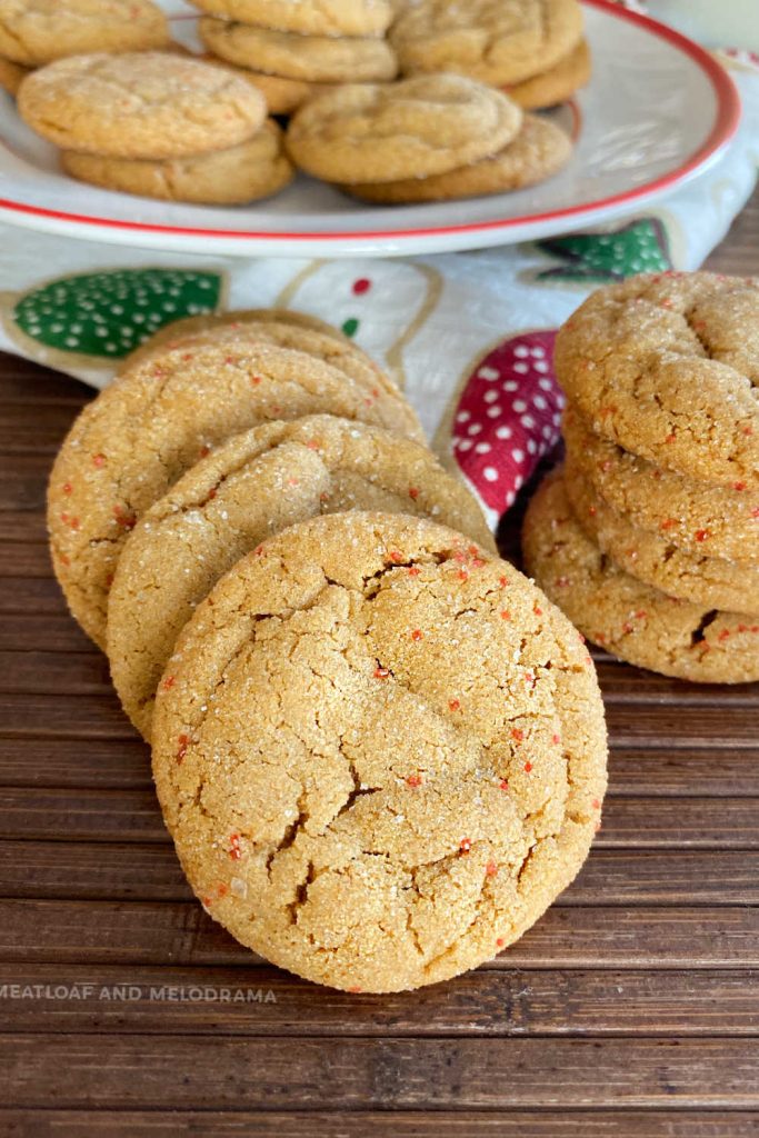 soft molasses cookies with red and white sugar on top
