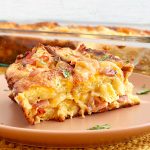 sliced ham and cheese strata on plate