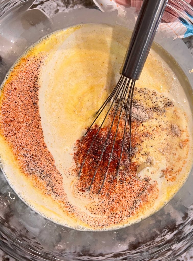 whisk egg custard ingredients in bowl