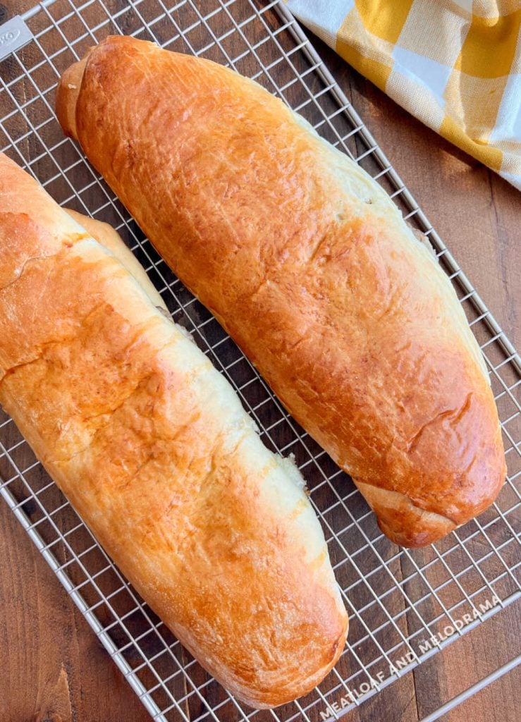 2 baked loaves of nut roll on the table