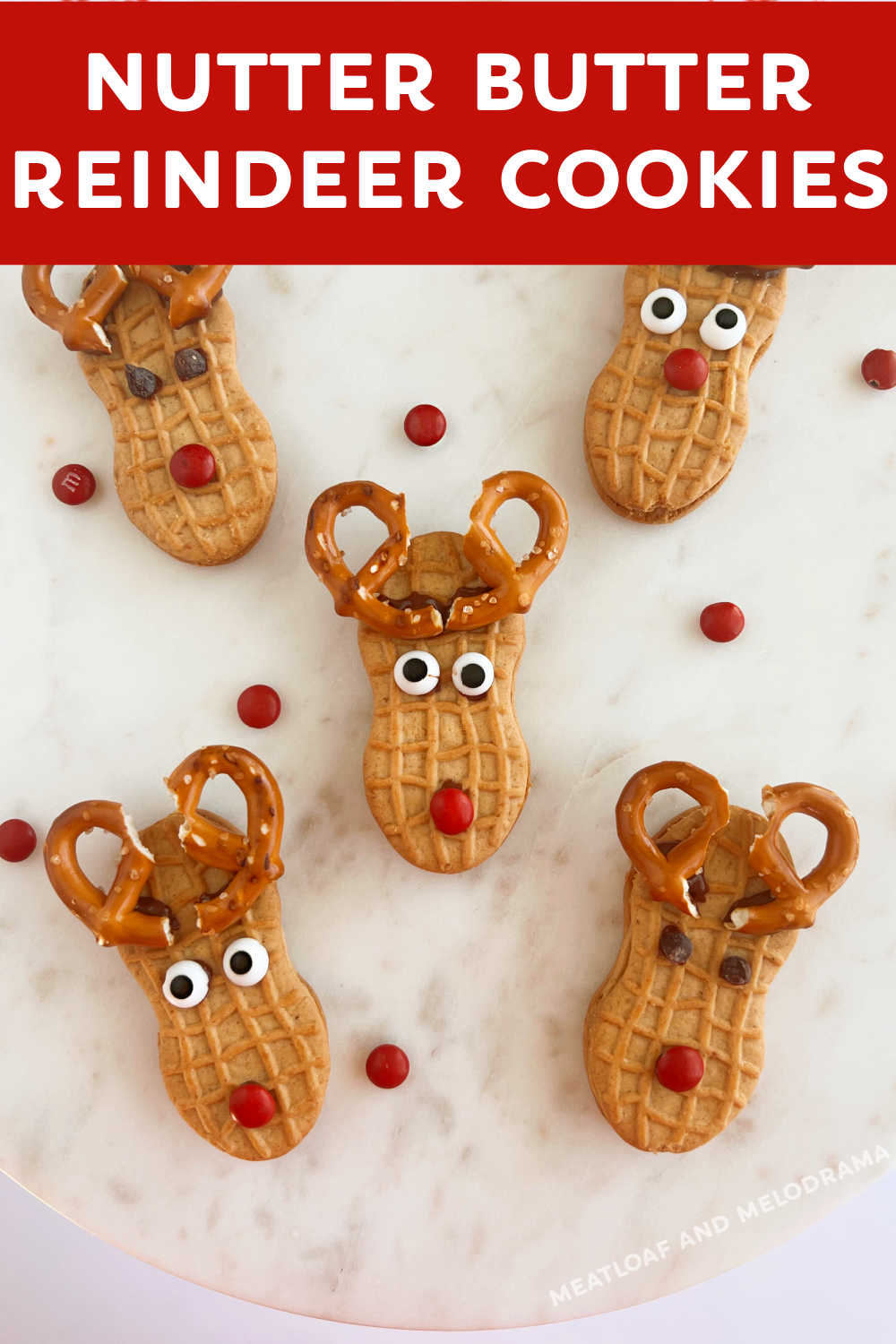 Nutter Butter Reindeer Cookies are easy no bake Christmas treats made with peanut butter cookies, pretzels and a few simple ingredients. These adorable reindeer cookies are perfect for holiday parties and cookie trays throughout the season! via @meamel