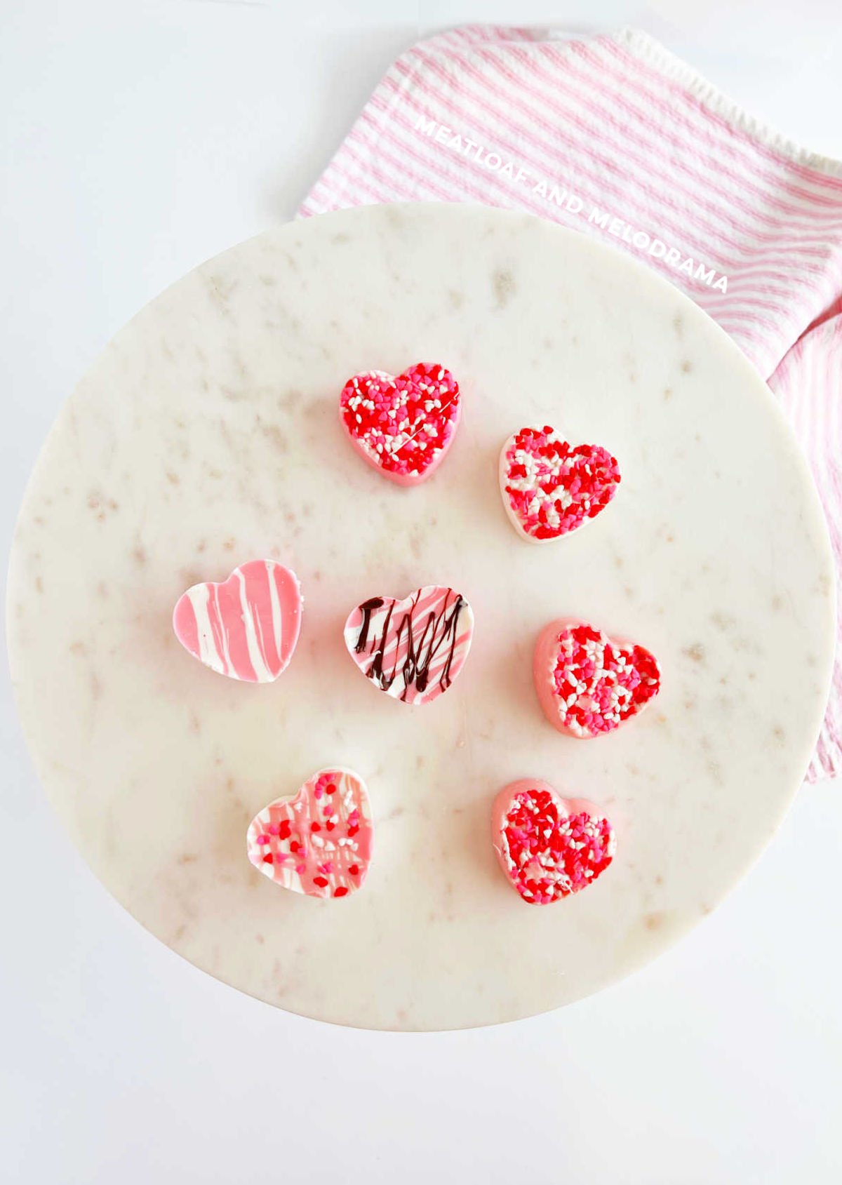 homemade white chocolate candy hearts decorated for valentine's day