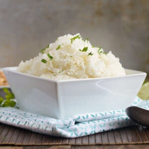 bowl of instant pot jasmine rice with parsley