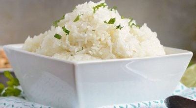 bowl of instant pot jasmine rice with parsley