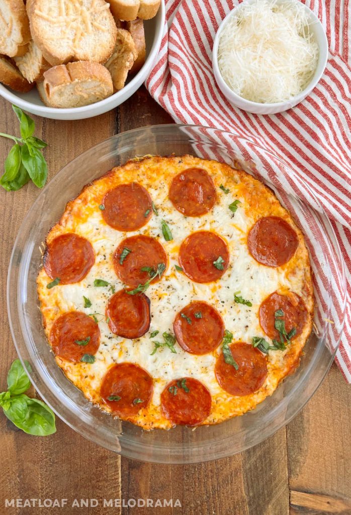 pepperoni dip or crustless pizza in a pie plate on the table