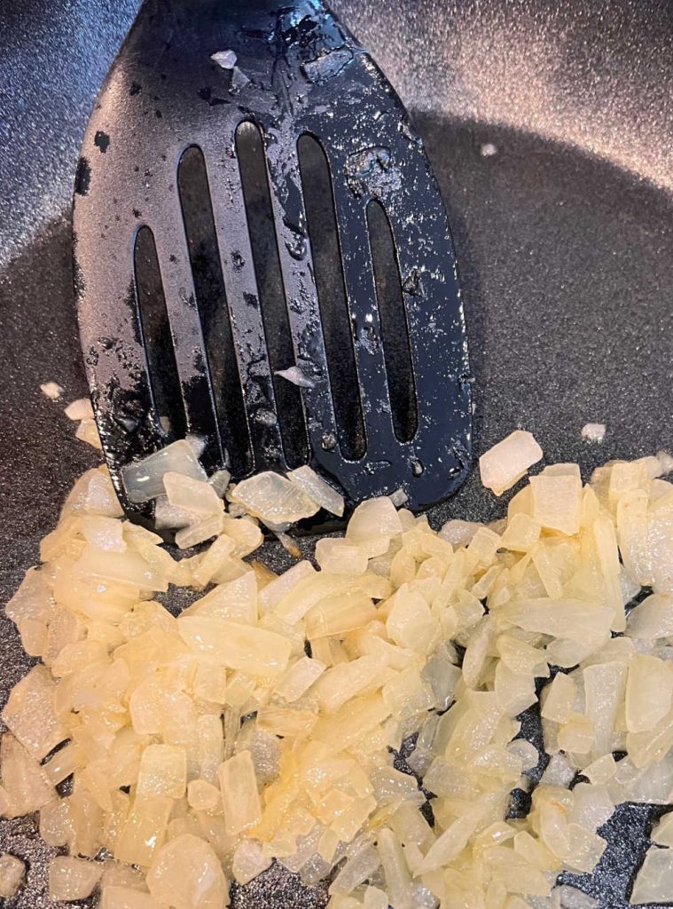 saute onions in butter in skillet