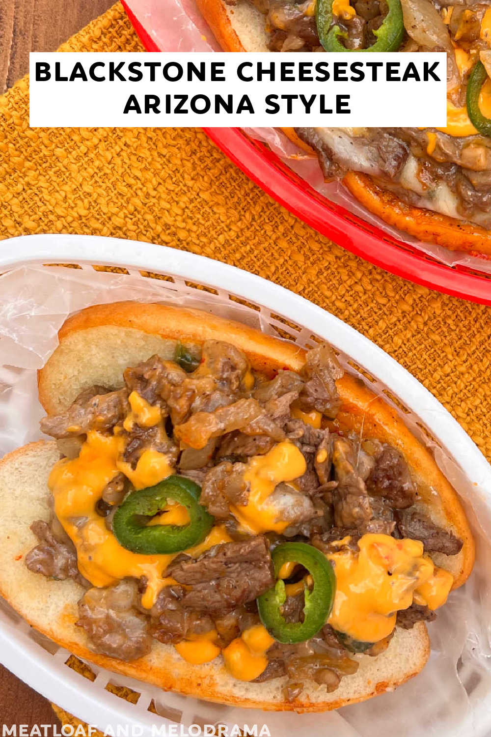 This Blackstone Cheesesteak recipe ( Arizona Style ) combines ribeye steak, jalapeño peppers and cheese on a bolillo roll. A delicious sandwich you can make on the Blackstone griddle or a skillet. This Southwest cheesesteak is not your average Philly cheesesteak recipe! via @meamel