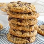 best oatmeal chocolate chip cookies stacked on the table