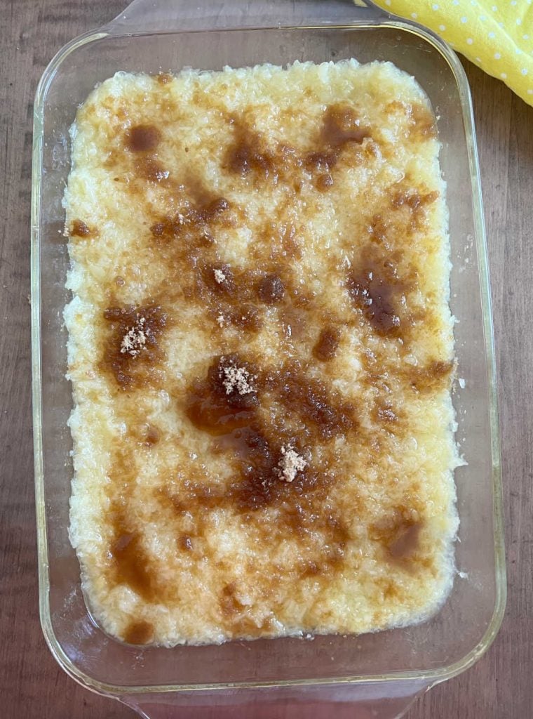 crushed pineapple and brown sugar in baking dish