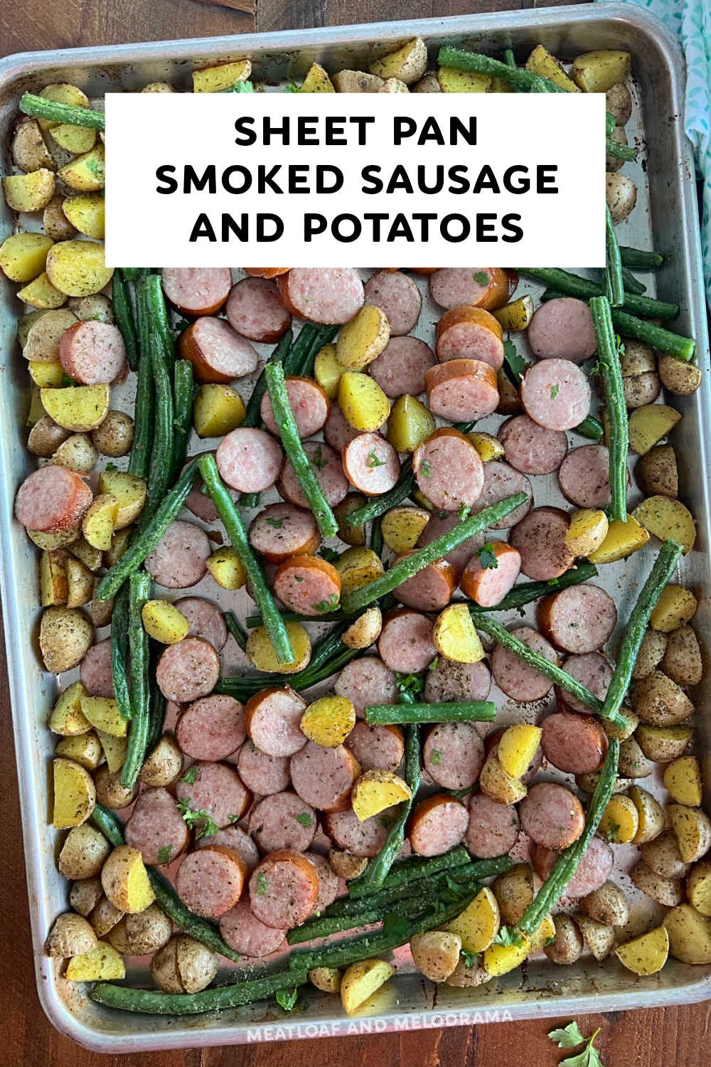 This Sheet Pan Smoked Sausage and Potatoes recipe with green beans is an easy weeknight meal with few ingredients that the whole family will love. It is super easy to make, takes just 25 minutes to bake, and clean-up is easy, too! via @meamel