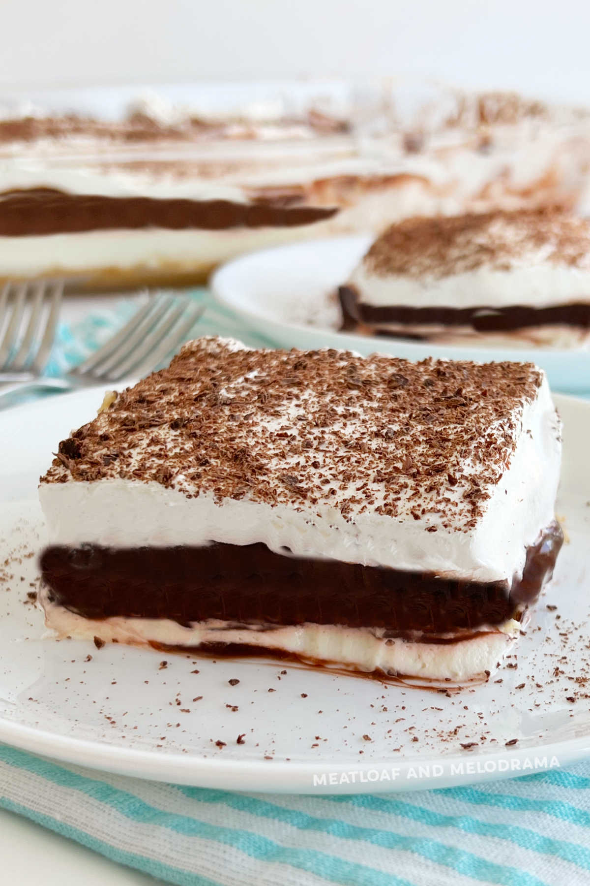 slices of grandma's layered chocolate delight recipe on the table