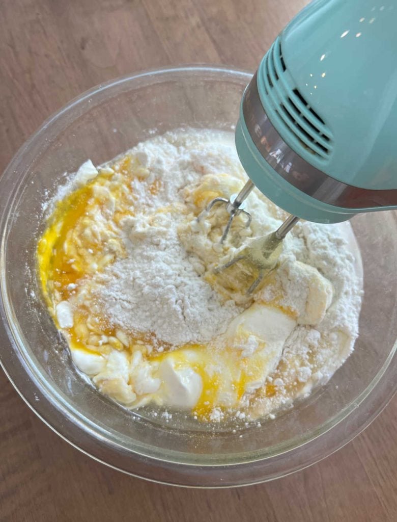 mix pound cake ingredients in mixing bowl with electric mixer