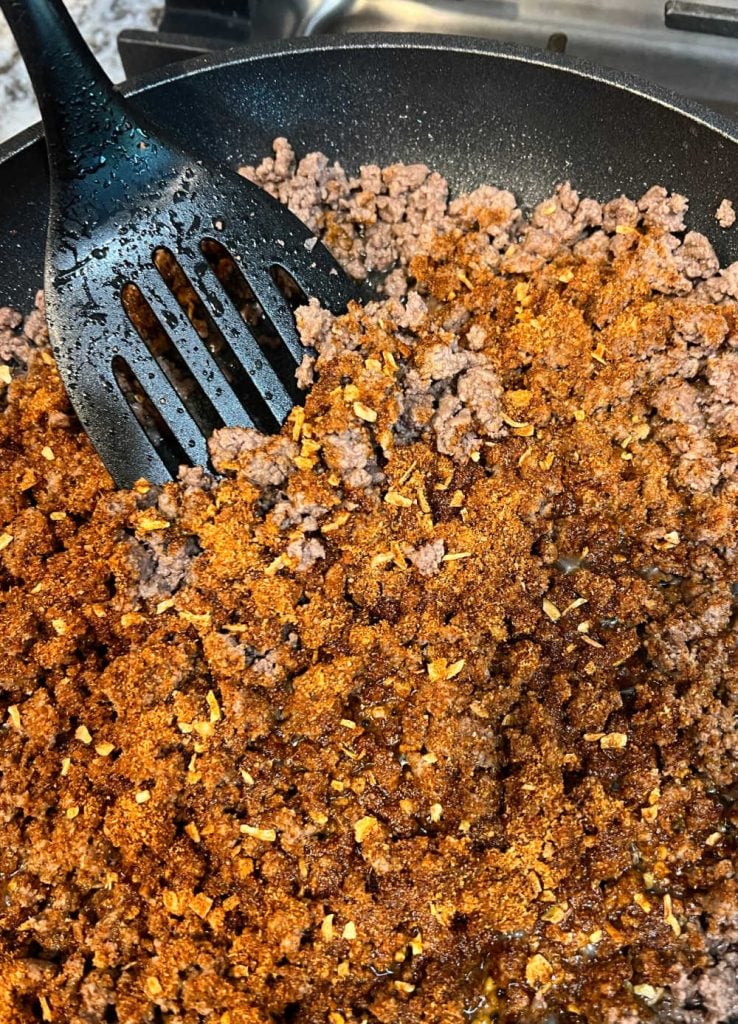 cook taco meat in skillet on stove