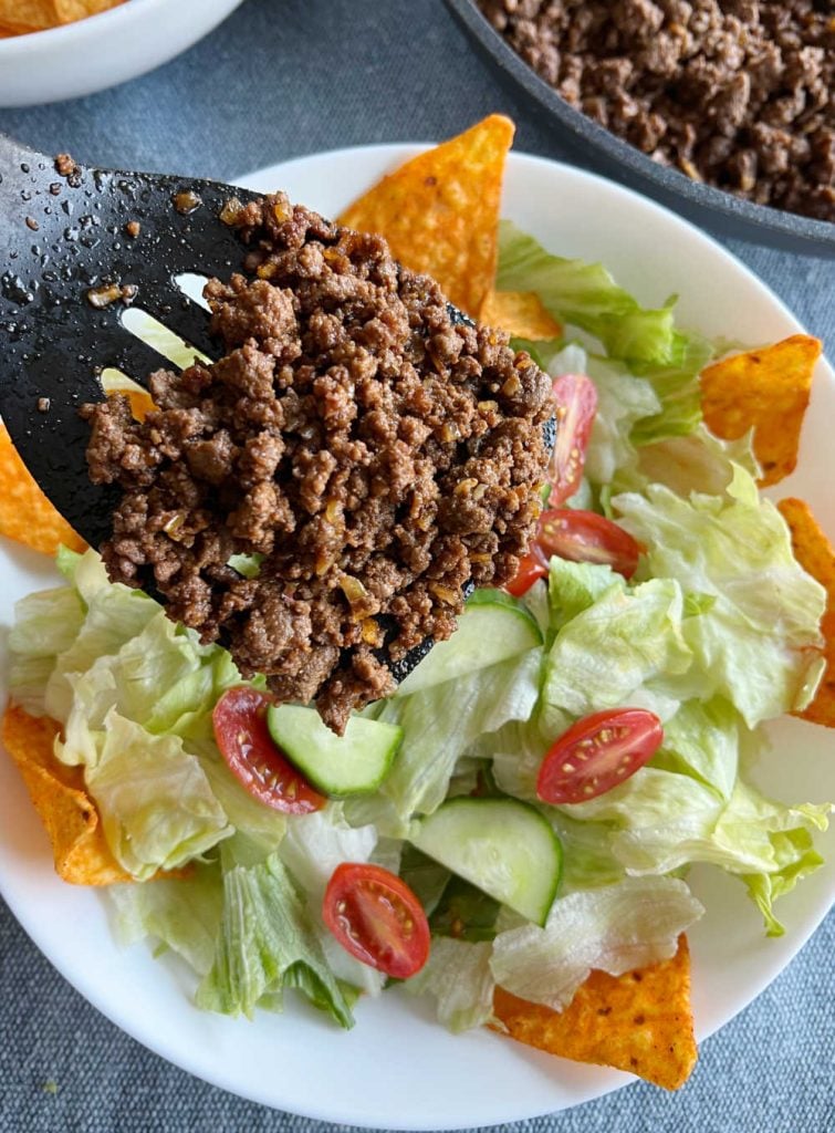add taco meat to salad ingredients