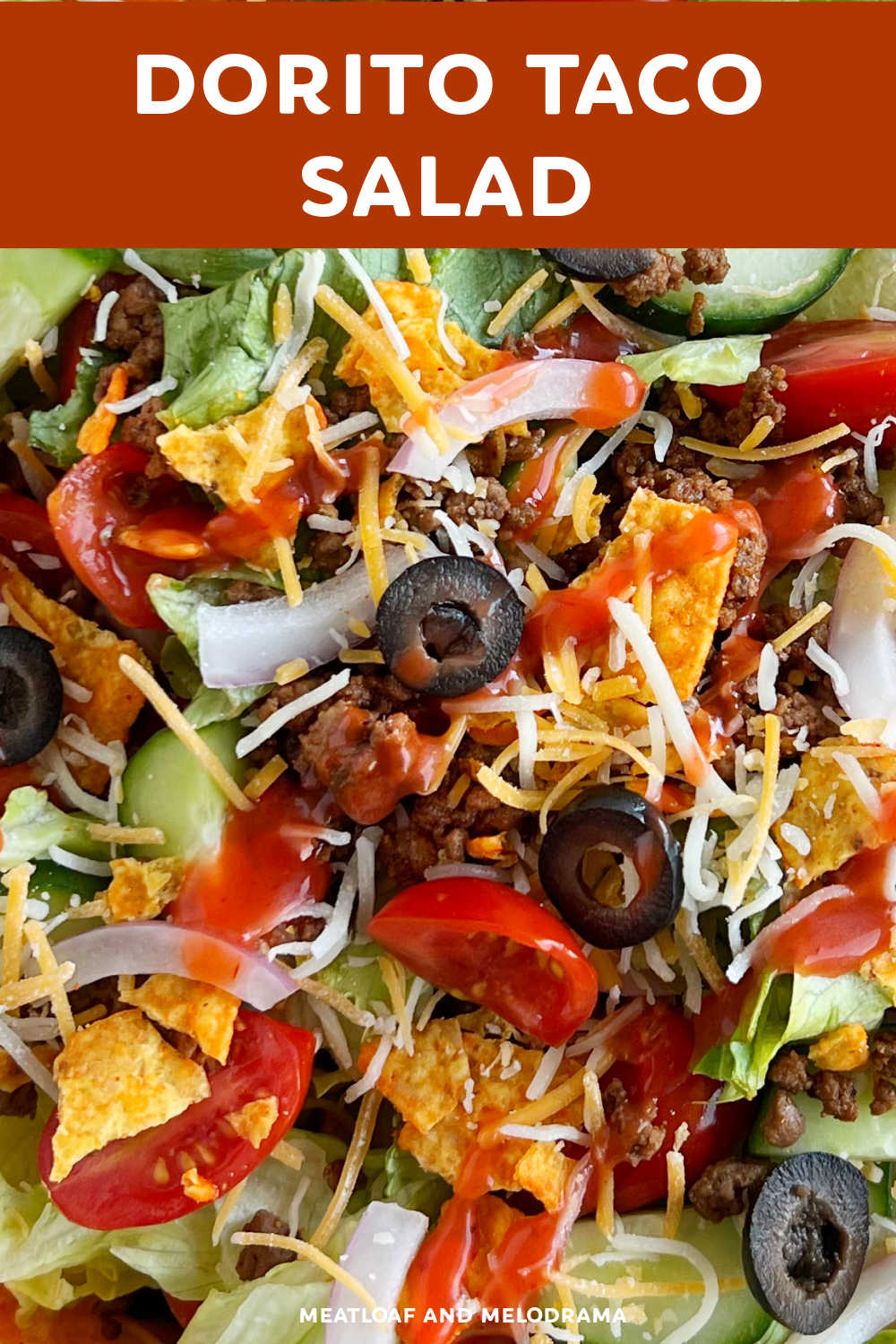 Easy Dorito Taco Salad with Doritos, Catalina Dressing and seasoned taco meat is a delicious salad and an easy meal your whole family will love. Perfect for a potluck dinner, family gatherings or a quick weeknight meal! via @meamel