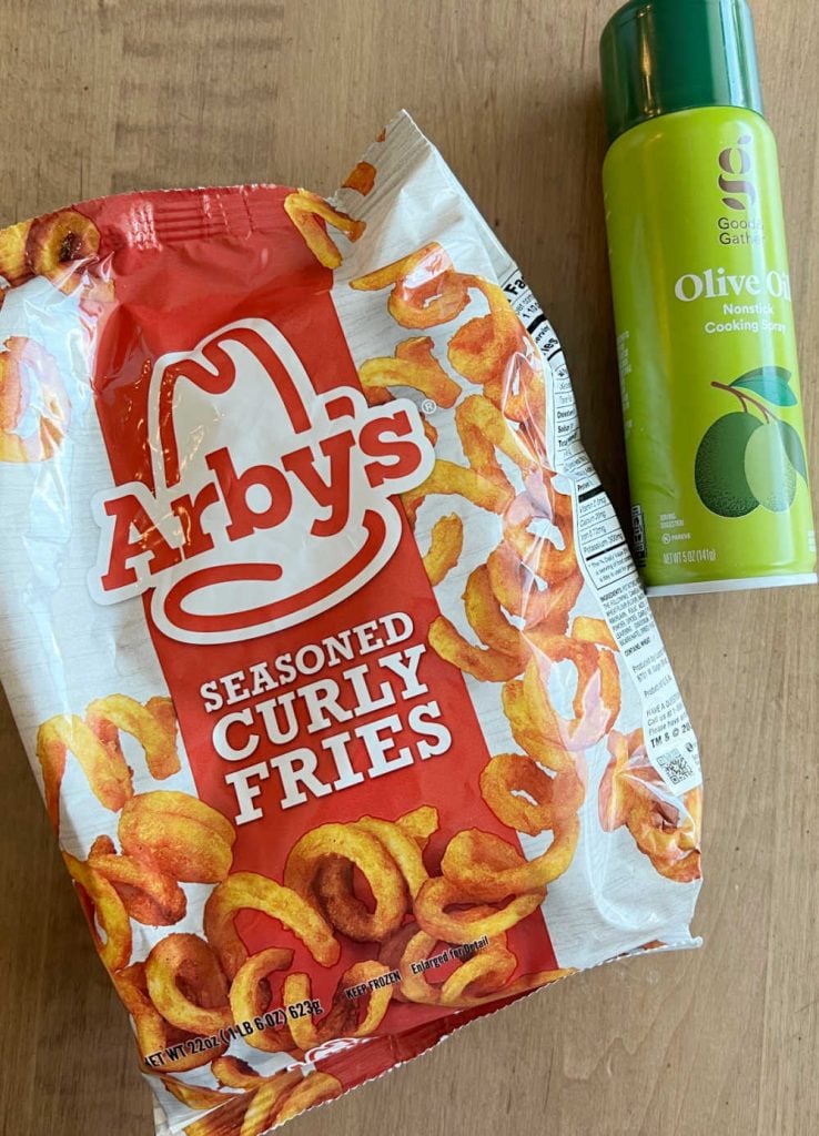 bag of aryb's frozen curly fries and olive oil spray