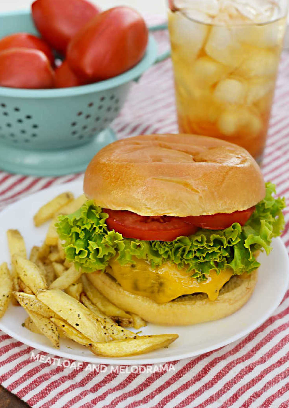 juicy air fryer burger recipe with cheese on a plate