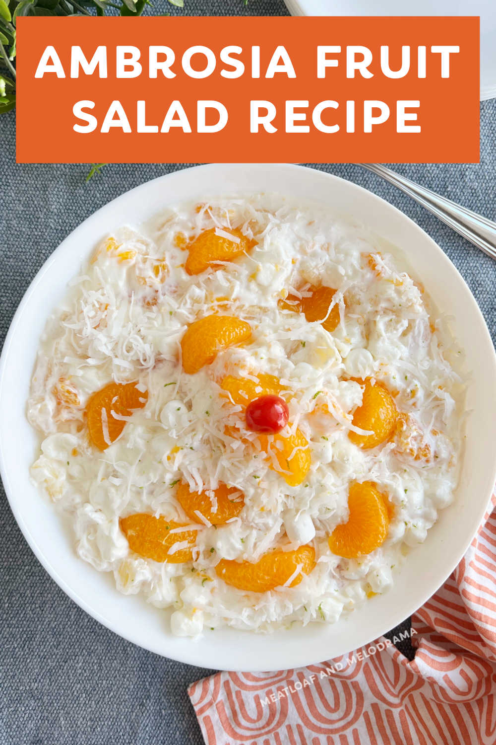 Ambrosia Fruit Salad recipe with sour cream, pineapple, mandarin oranges, mini marshmallows and coconut is a classic dessert salad. This creamy fruit salad is perfect for family dinners and special occasions! via @meamel