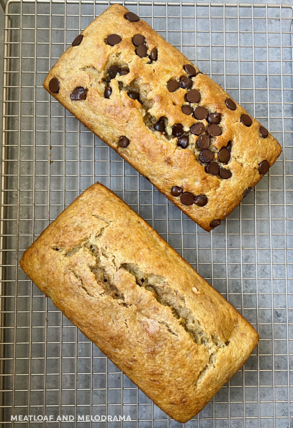 2 loaves of banana bread with cake mix on cooling rack with chocolate chips