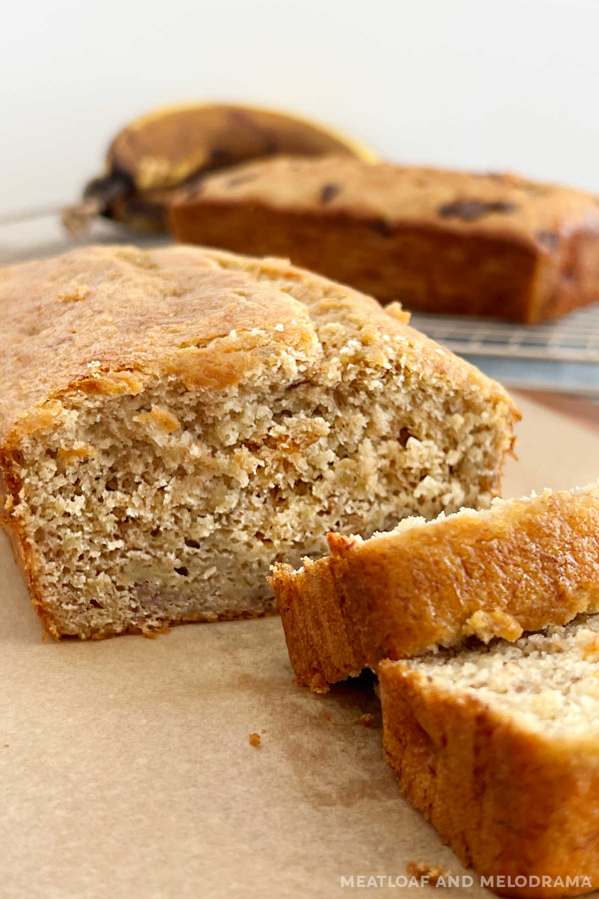 easy banana bread recipe with cake mix sliced on the table