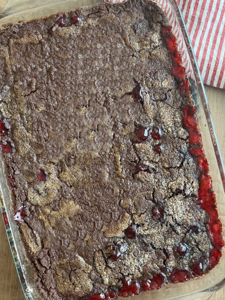 baked chocolate cherry dump cake on table