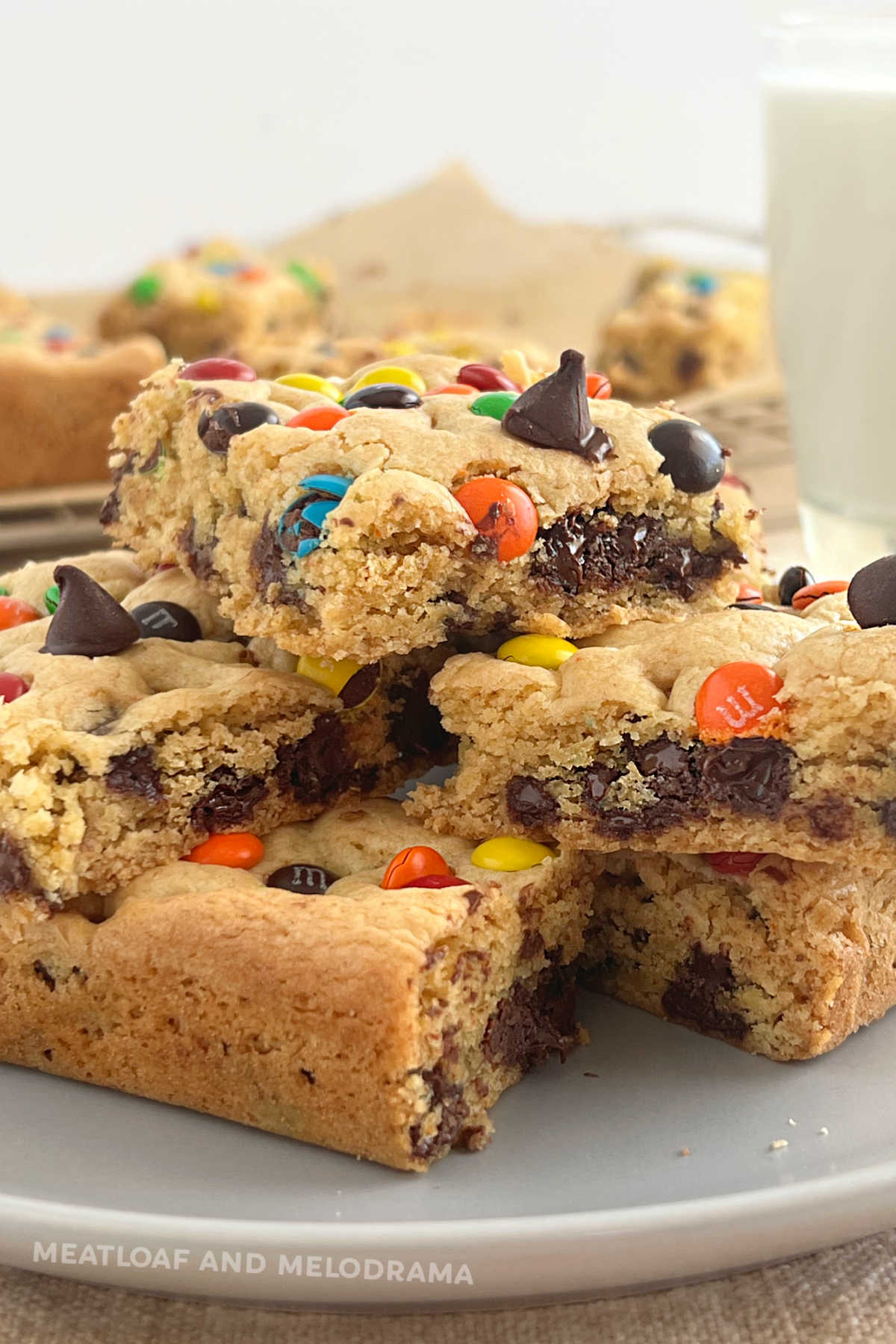loaded cookie bars made with cake mix on a plate