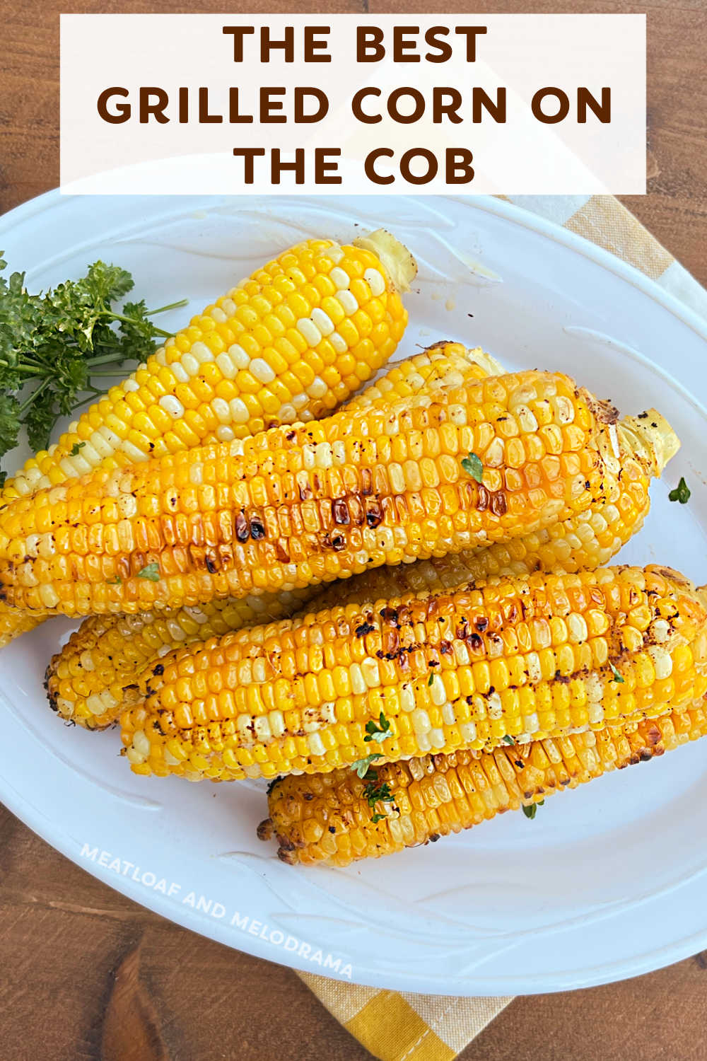 Grilled Corn on the Cob in Foil is the best way to grill fresh corn and our favorite way to make it! Grilled corn in foil packets is an easy recipe for a delicious  summer side dish that everyone loves and goes well with anything else you cook on the grill. You'll love the easy clean-up, too! via @meamel