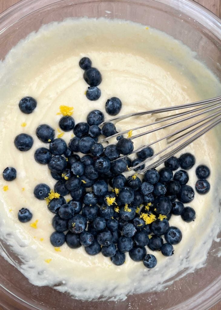 stir blueberries and lemon zest into muffin batter