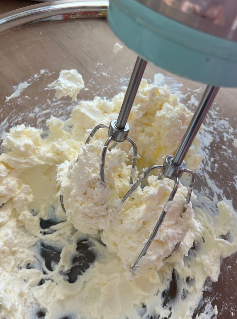cream butter and sugar in mixing bowl