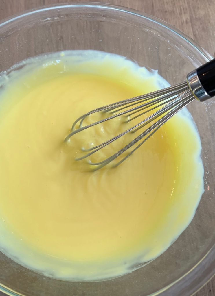 whisk instant vanilla pudding mix and milk in mixing bowl