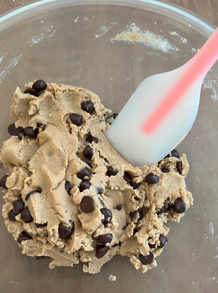 stir chocolate chips into edible cookie dough