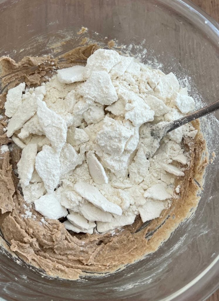 stir flour into creamed butter and sugar in mixing bowl