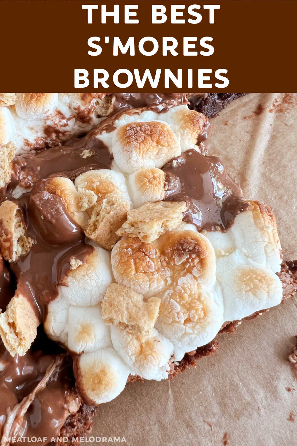 This S'mores Brownies recipe makes fudgy brownies topped with toasted marshmallows, graham crackers and chocolate bars. A delicious dessert you can make in one bowl. The whole family loves these homemade brownies! via @meamel