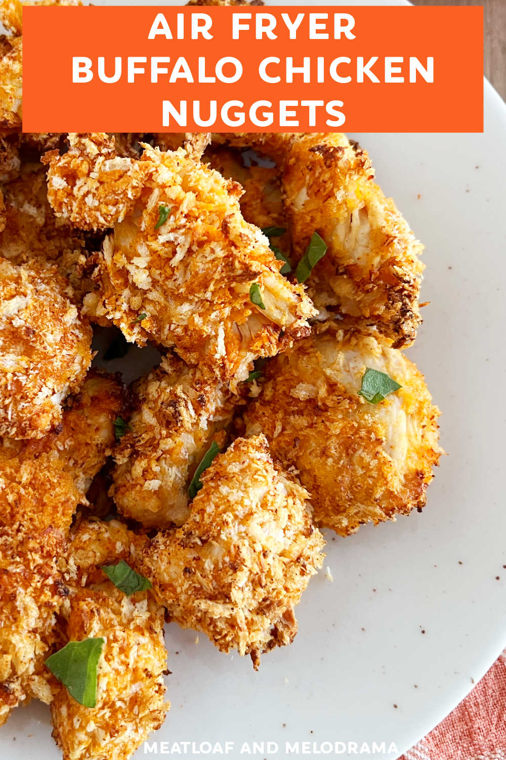 Air Fryer Buffalo Chicken Nuggets are boneless chicken breast bites dunked in hot sauce and panko bread crumbs and air fried until crispy.  An easy appetizer or quick dinner! Air fryer Buffalo chicken bites are the perfect snack for football season!  via @meamel