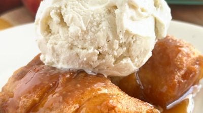 crescent roll peach dumplings with scoop of vanilla ice cream