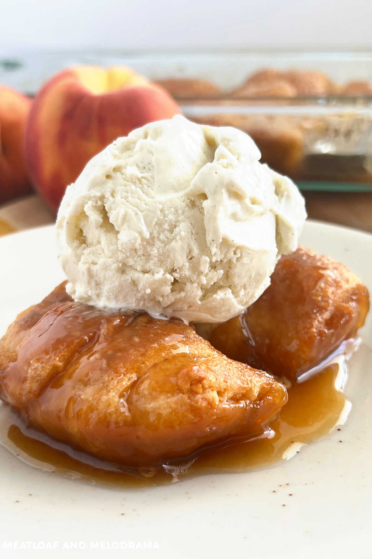 peach dumplings made with crescent rolls and sprite with vanilla ice cream on top