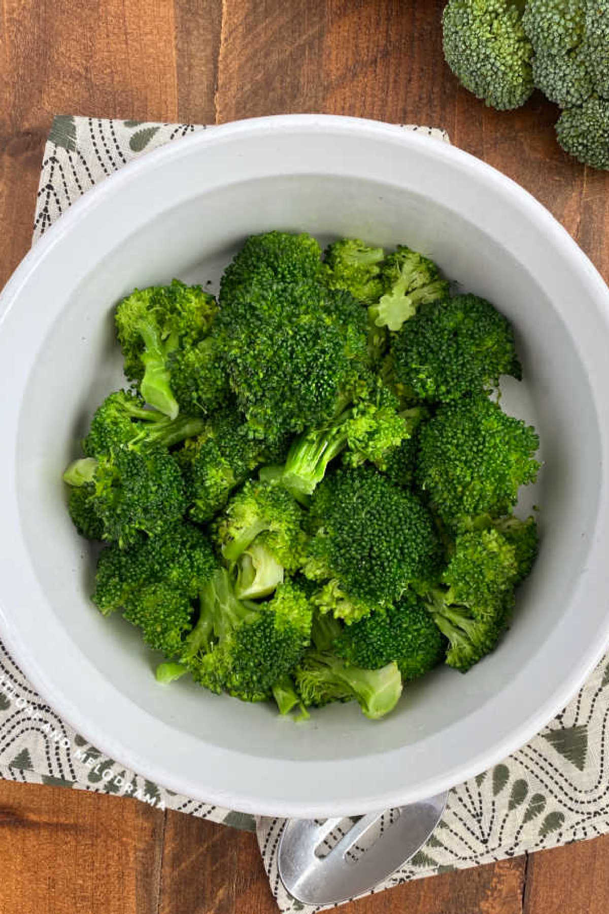 steamed microwave broccoli in white dish