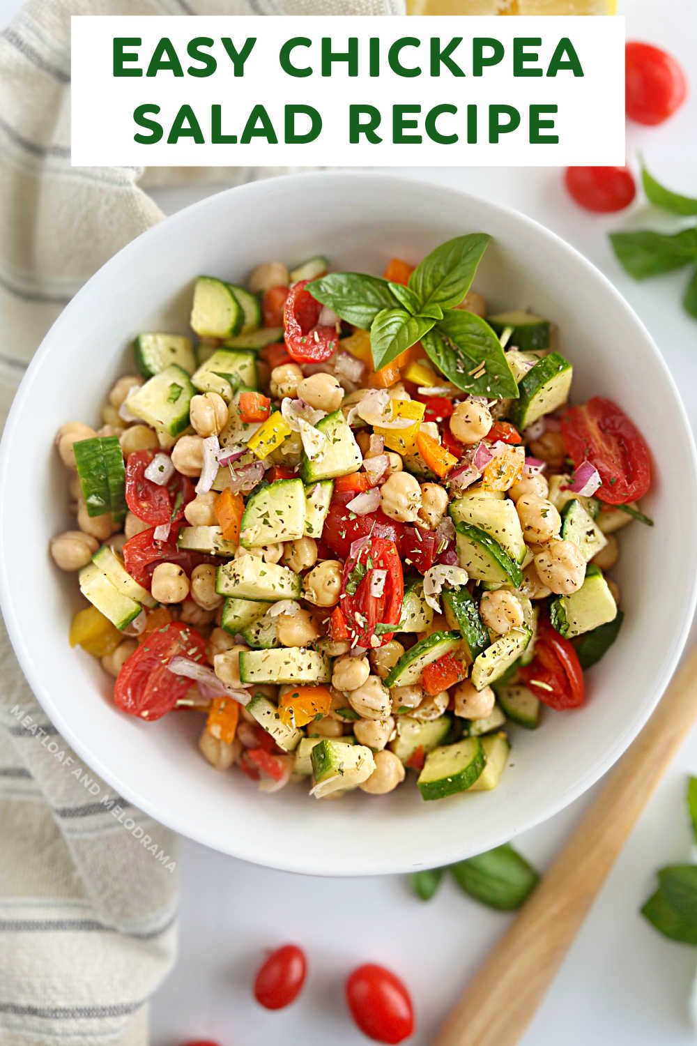 Simple Chickpea Salad Recipe with cucumbers, tomatoes and bell peppers in a quick homemade dressing is an easy high protein salad perfect for meal prep. Enjoy this easy garbanzo bean salad for a delicious lunch, or add grilled chicken for a complete meal. via @meamel