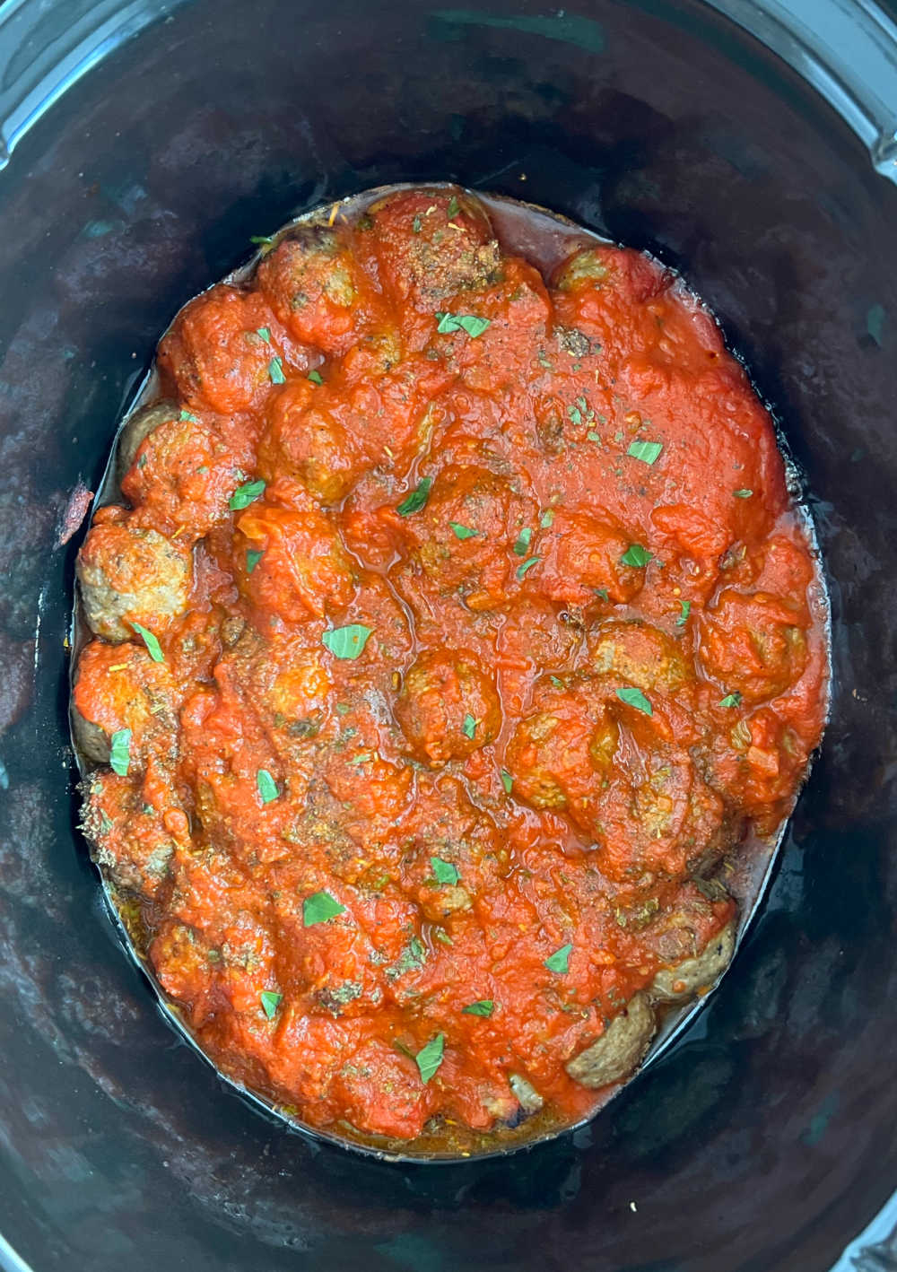 Italian meatballs in marinara sauce in crock pot