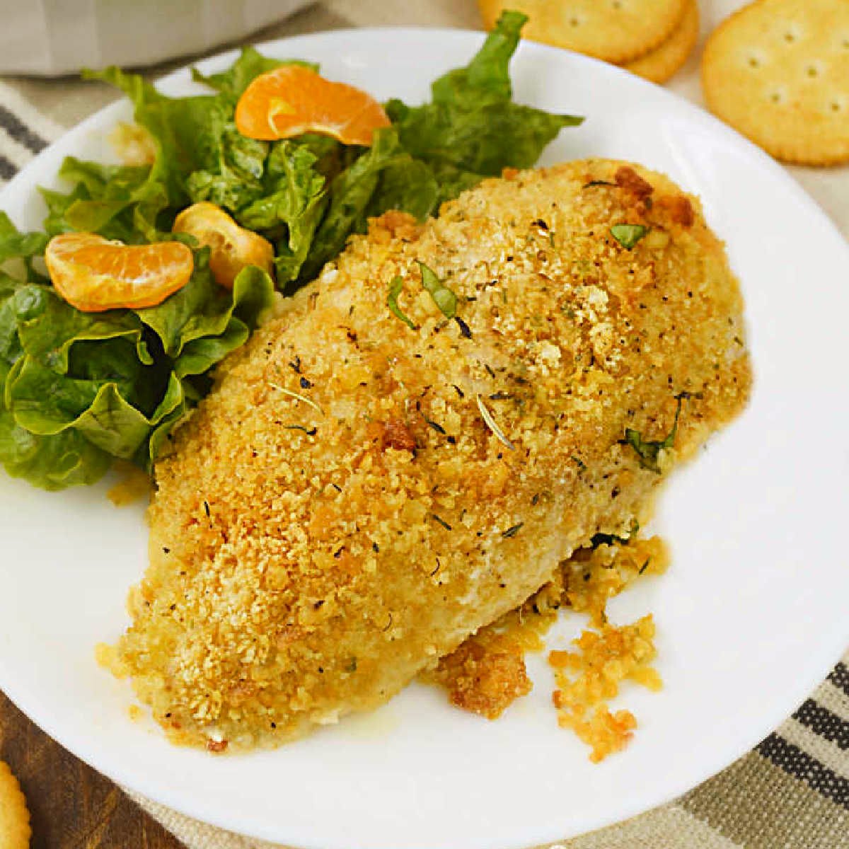 ritz cracker chicken breast on plate with salad
