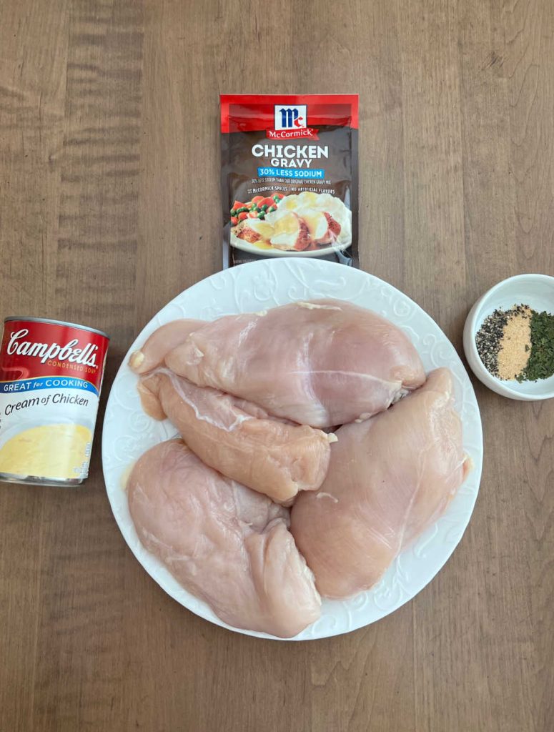 chicken breasts, cream of chicken soup, chicken gravy packet and seasonings