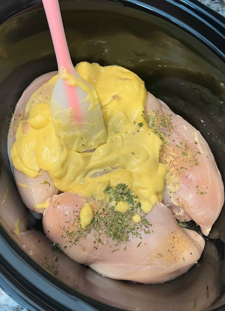seasoned chicken breasts with cream of chicken soup in crockpot