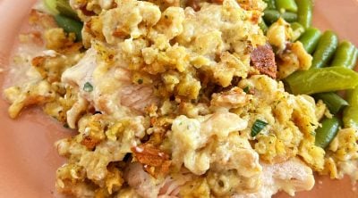 crockpot chicken and stuffing with green beans on a plate